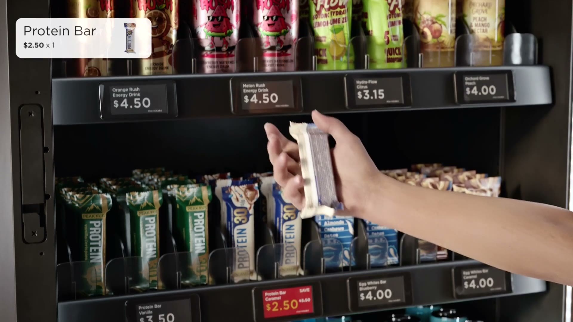 A hand taking an item from an open Smart Store