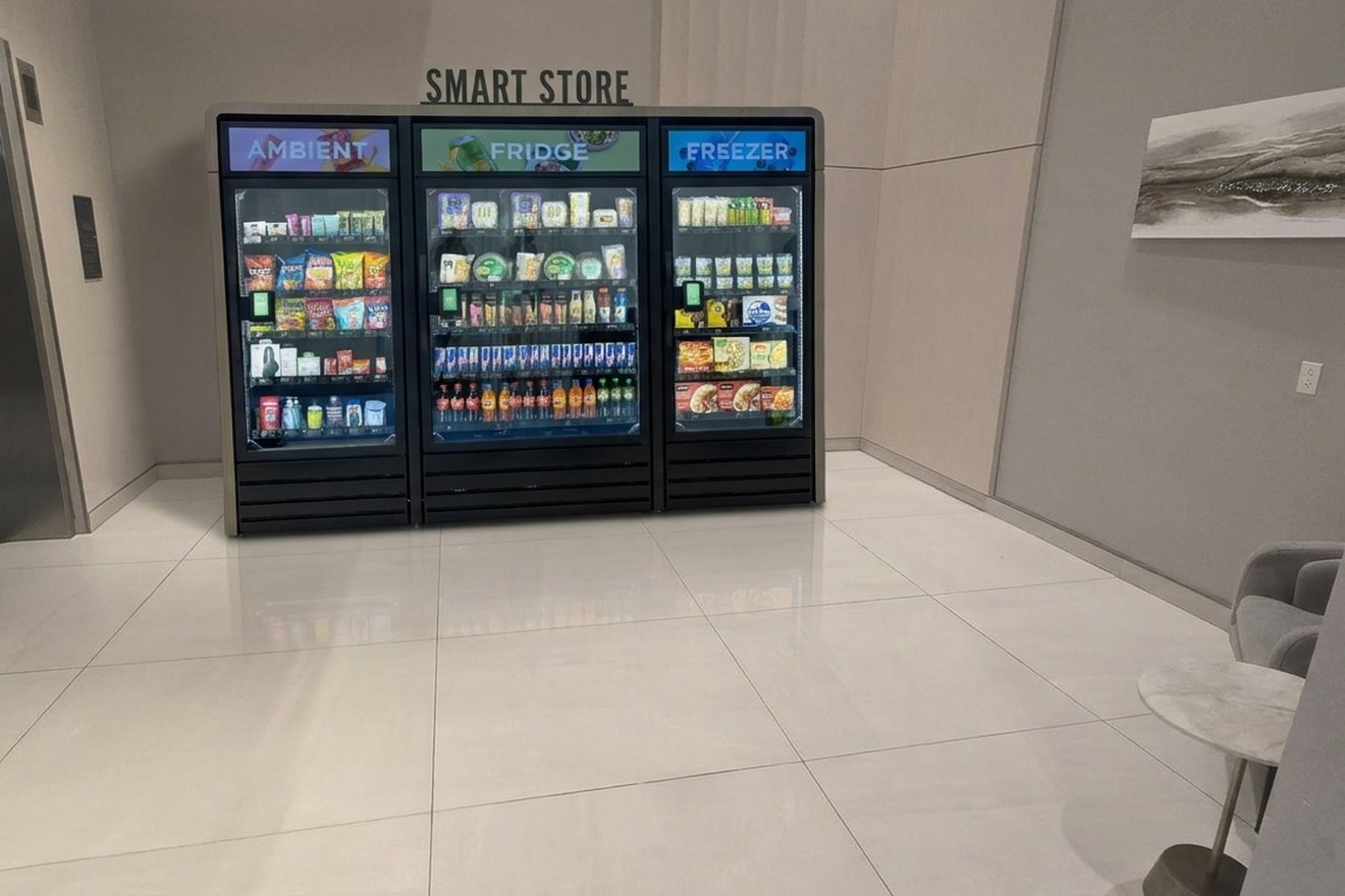 A three-unit Smart Store shown in a condo lobby